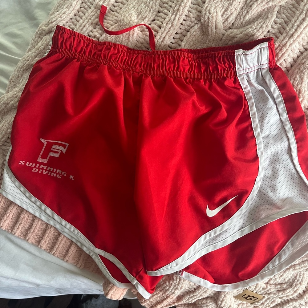 Nike red running shorts